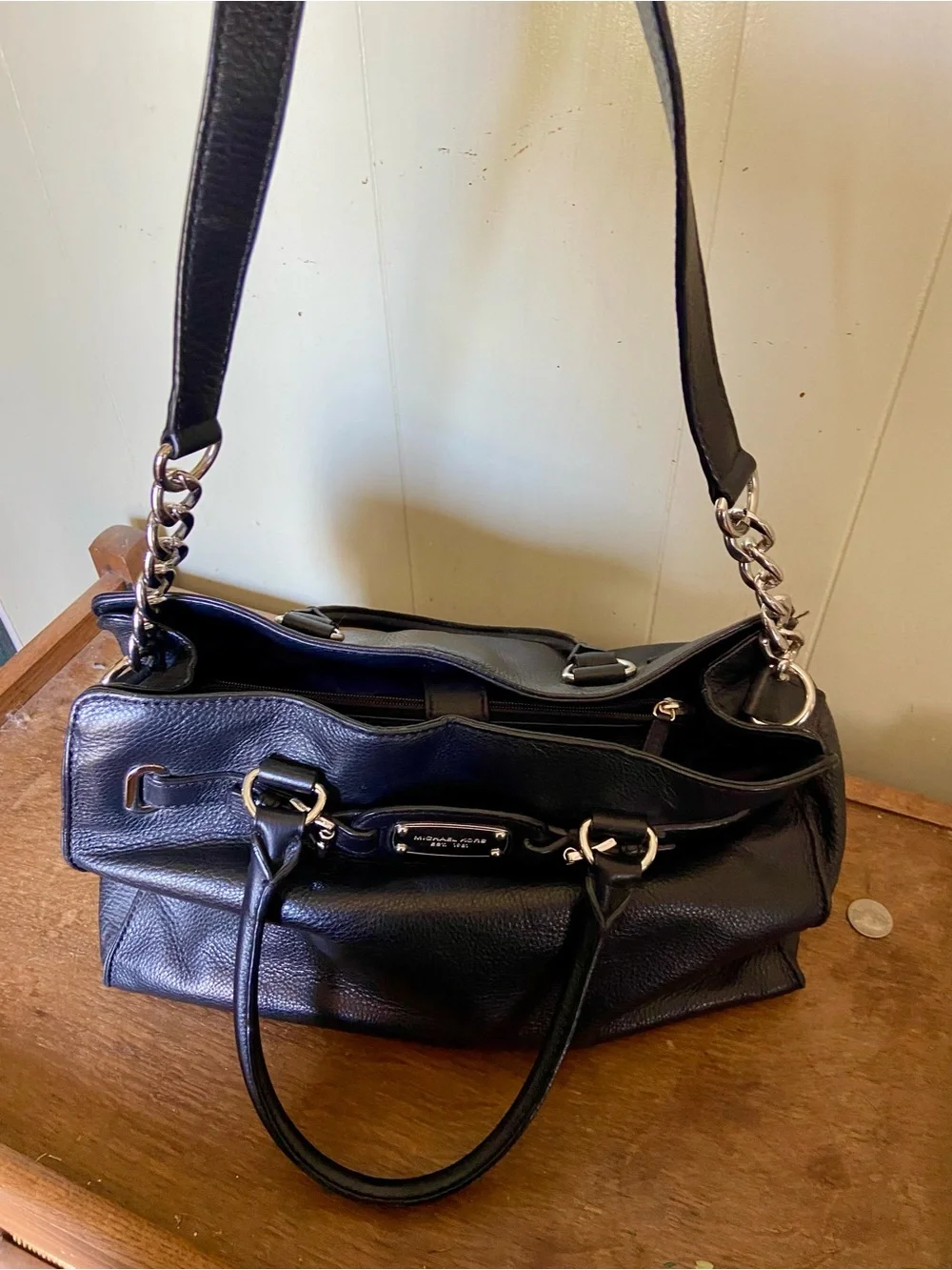 Michael Kors Black Pebbled Leather Satchel with Silver-Tone Plaque